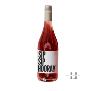 a bottle with a label that says Sip sip hooray